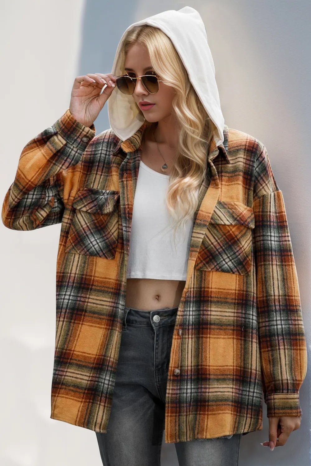 Double Take Drawstring Plaid Long Sleeve Hooded Shacket designed for comfort and style at Lookzlike