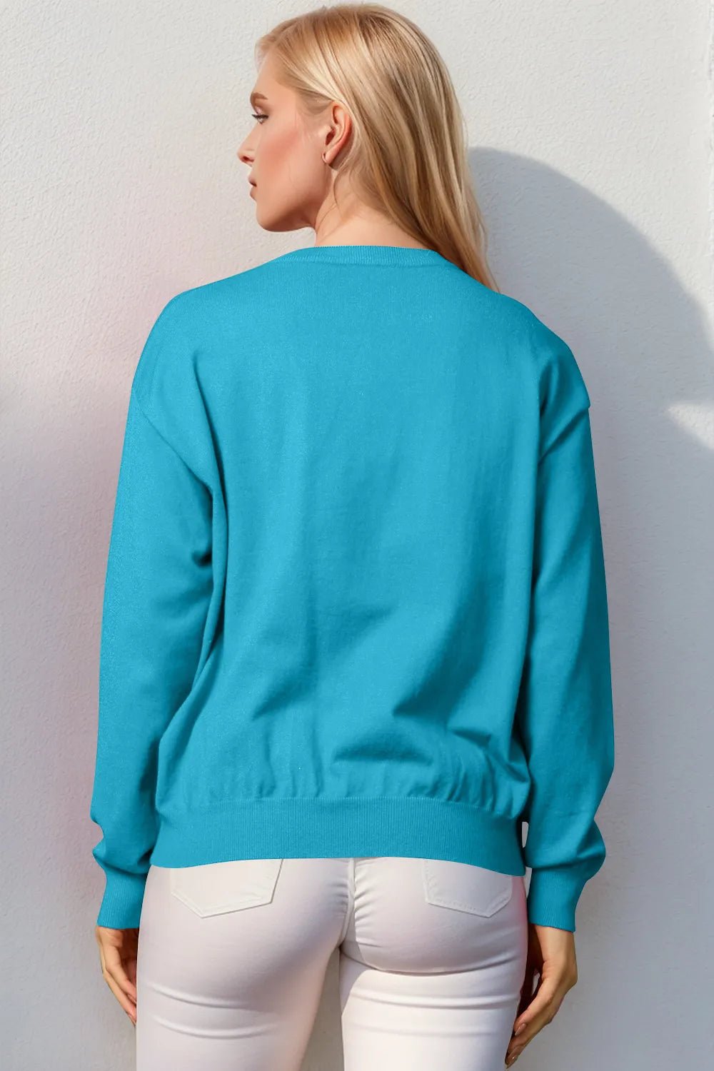 Double Take Full Size Nutcracker Sequin Long Sleeve Sweater designed for comfort and style at Lookzlike