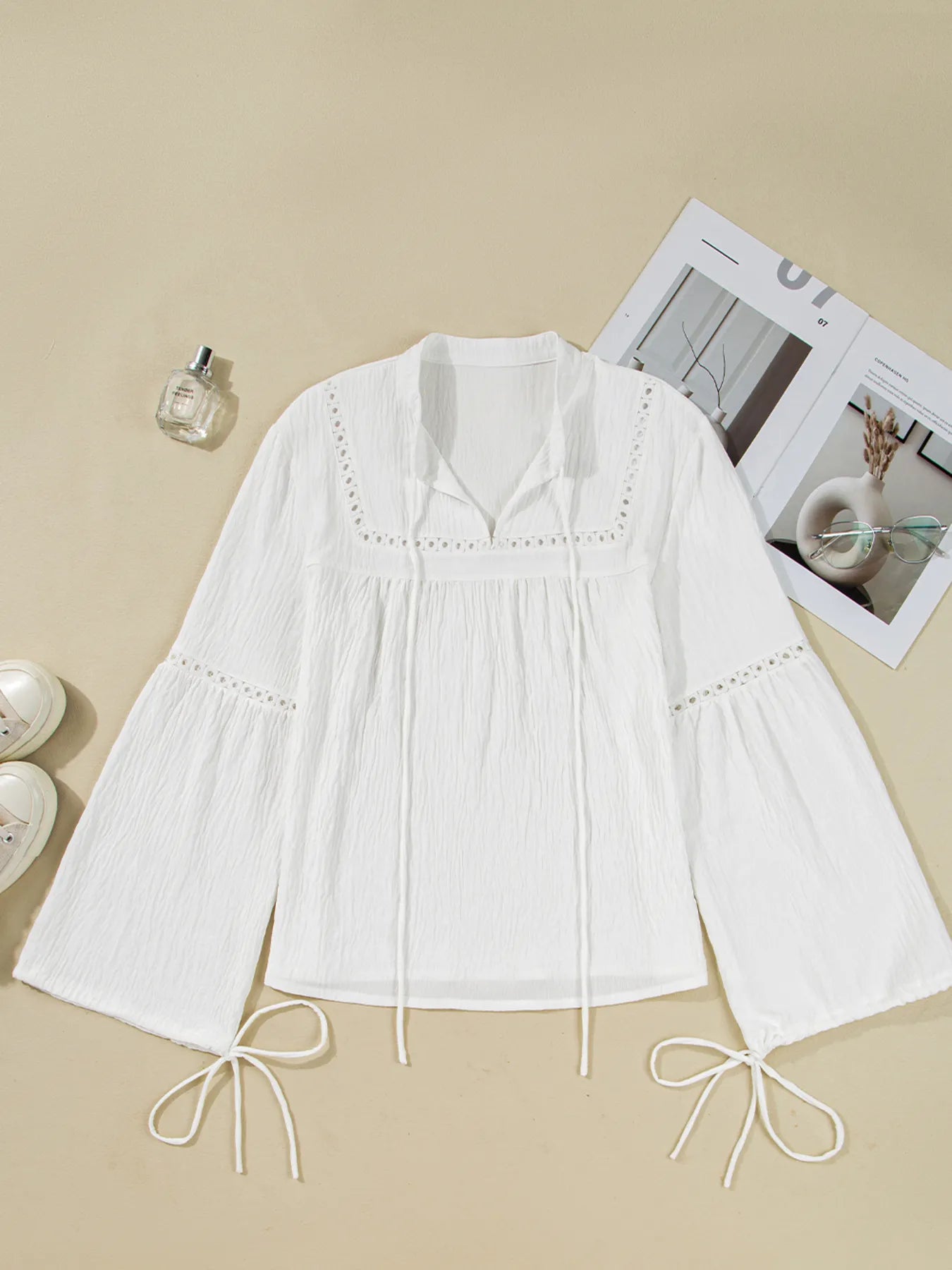 Drawstring Puff Sleeve Tie Neck Blouse designed for comfort and style at Lookzlike