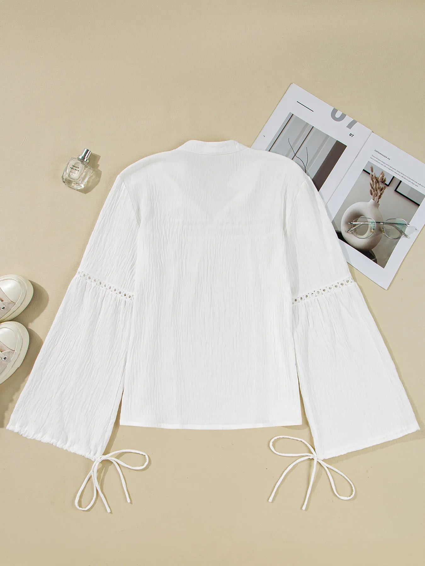 Drawstring Puff Sleeve Tie Neck Blouse designed for comfort and style at Lookzlike