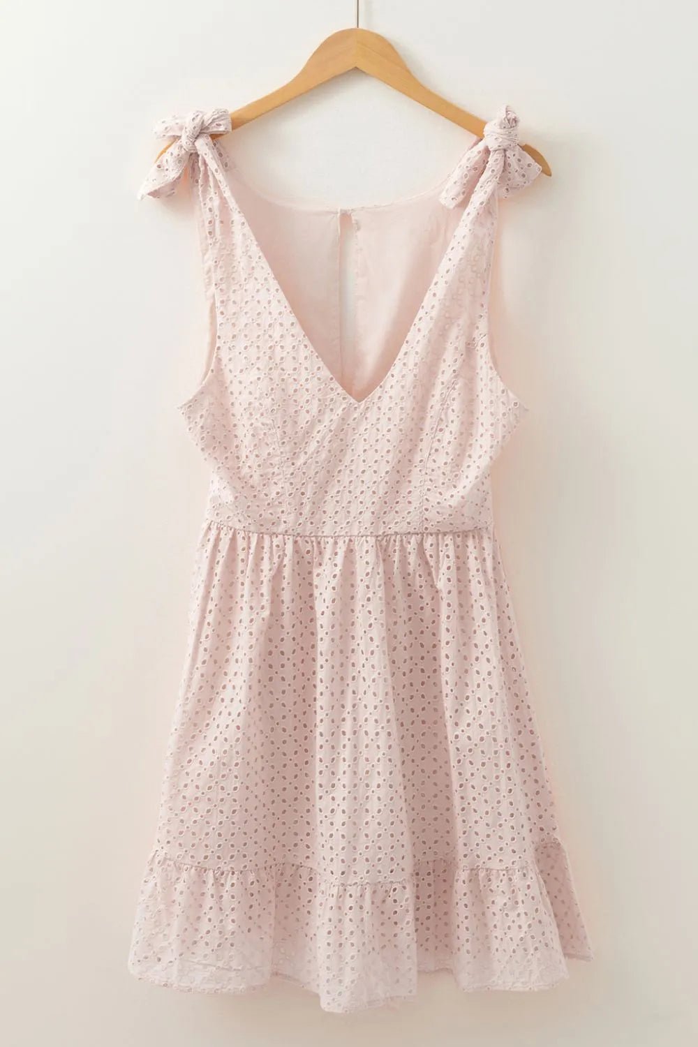 Embroidered Eyelets Ruffled Hem Sleeveless Mini Dress designed for comfort and style at Lookzlike