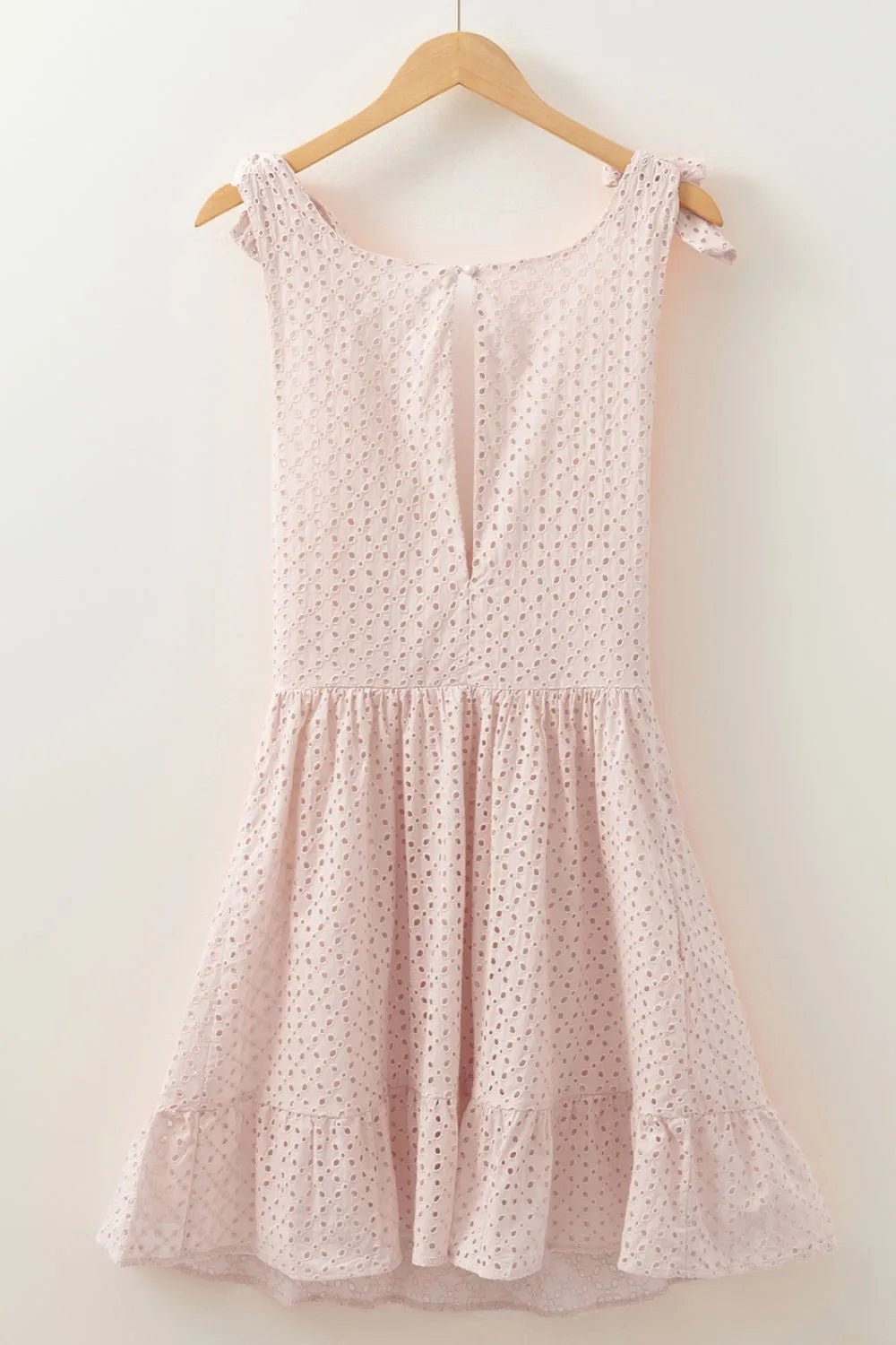 Embroidered Eyelets Ruffled Hem Sleeveless Mini Dress designed for comfort and style at Lookzlike