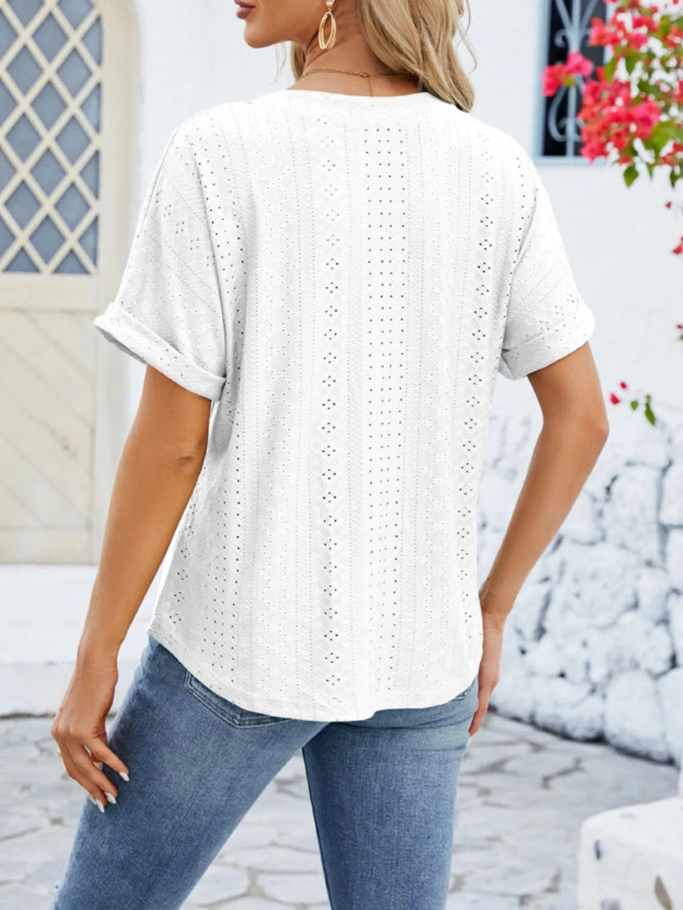 Eyelet Notched Short Sleeve Blouse designed for comfort and style at Lookzlike