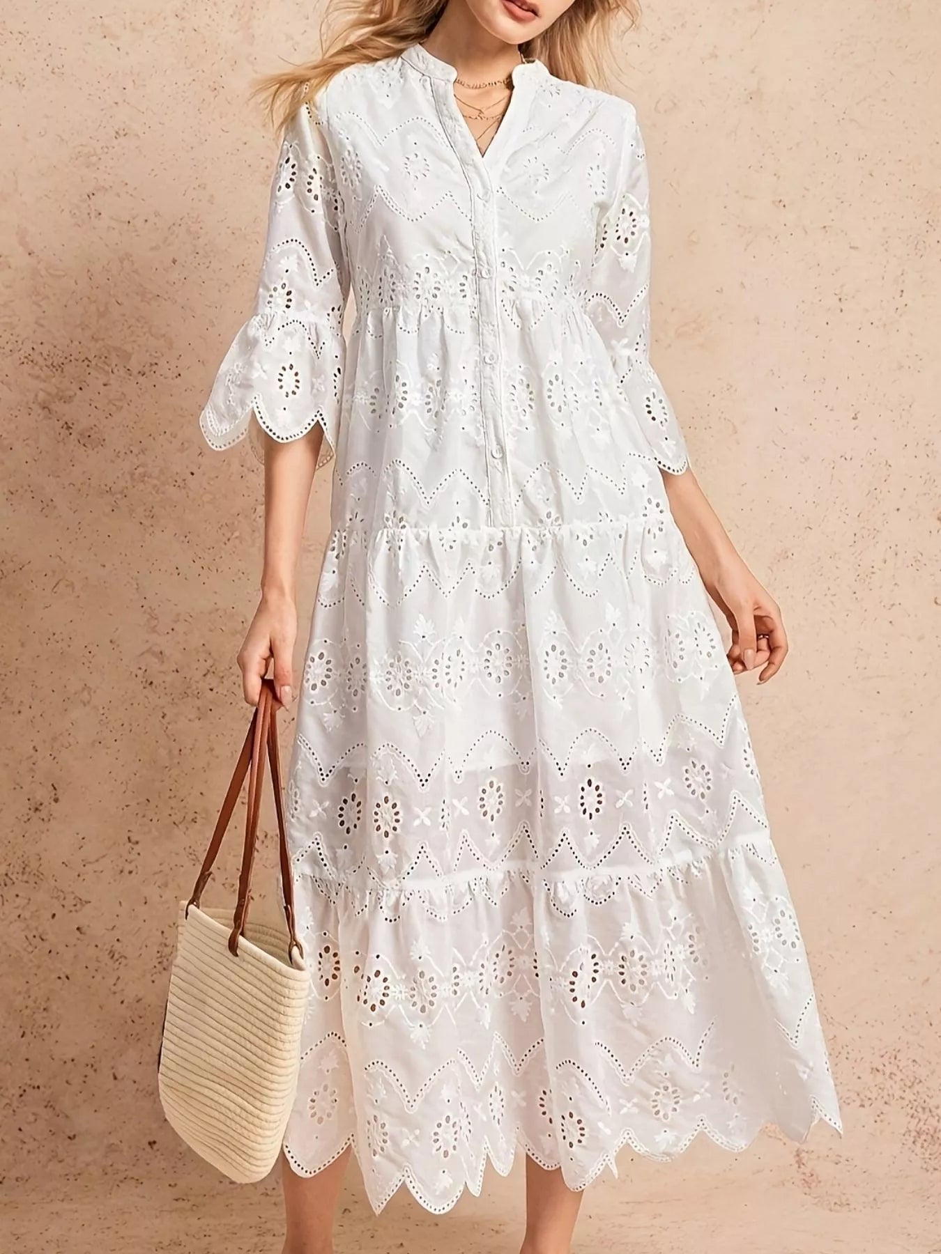 Eyelet Notched Tiered Midi Dress designed for comfort and style at Lookzlike