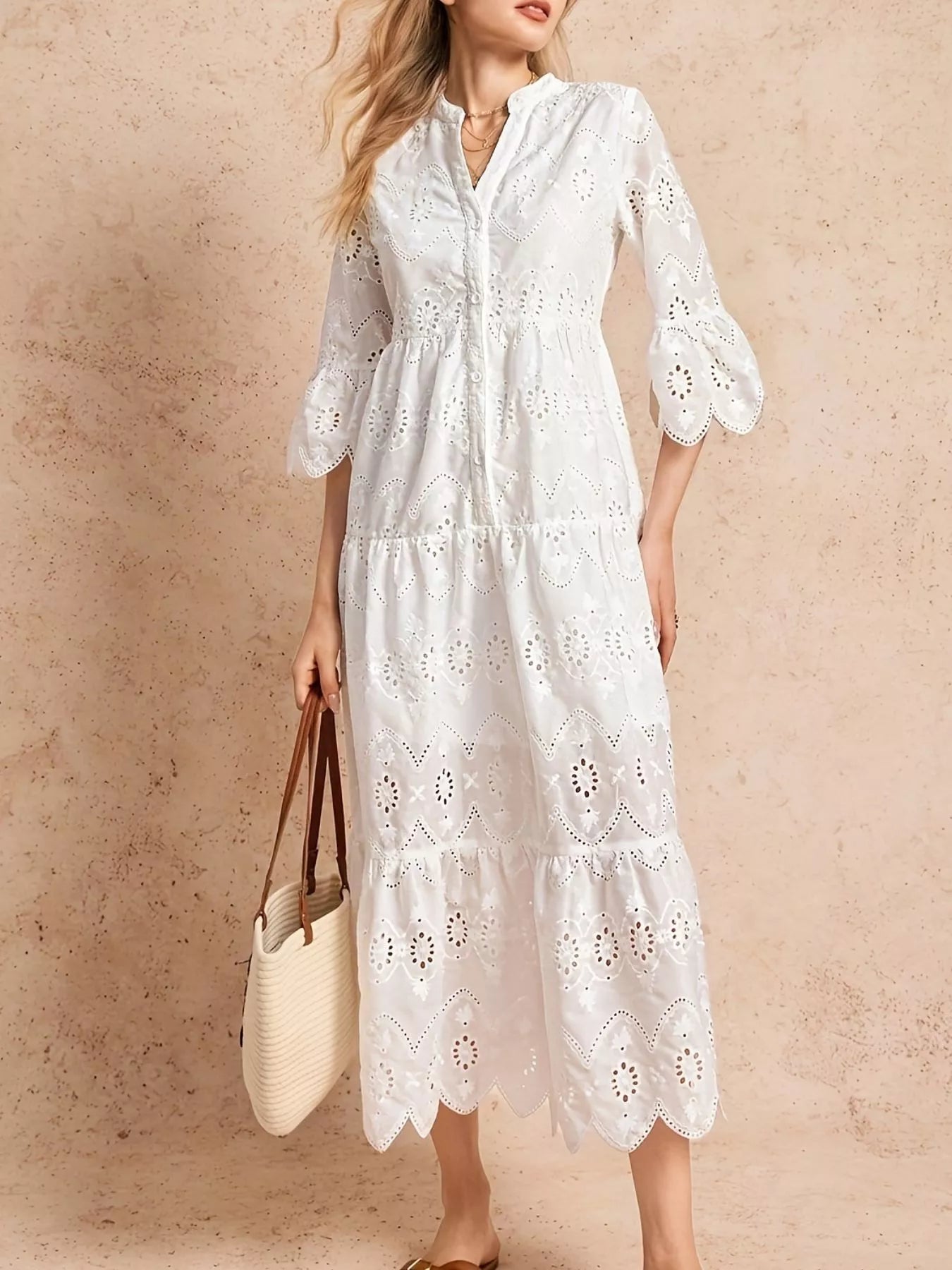 Eyelet Notched Tiered Midi Dress designed for comfort and style at Lookzlike