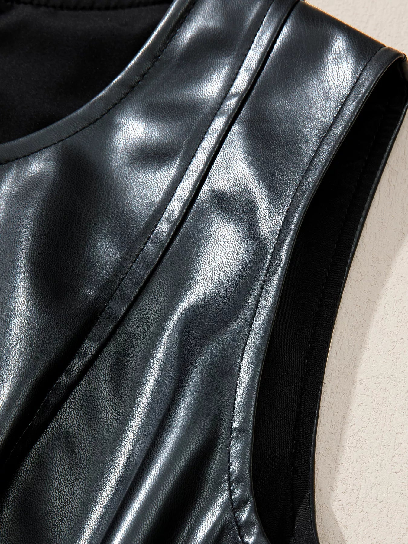 Faux Leather Ruffle Hem Sleeveless Mini Dress designed for comfort and style at Lookzlike