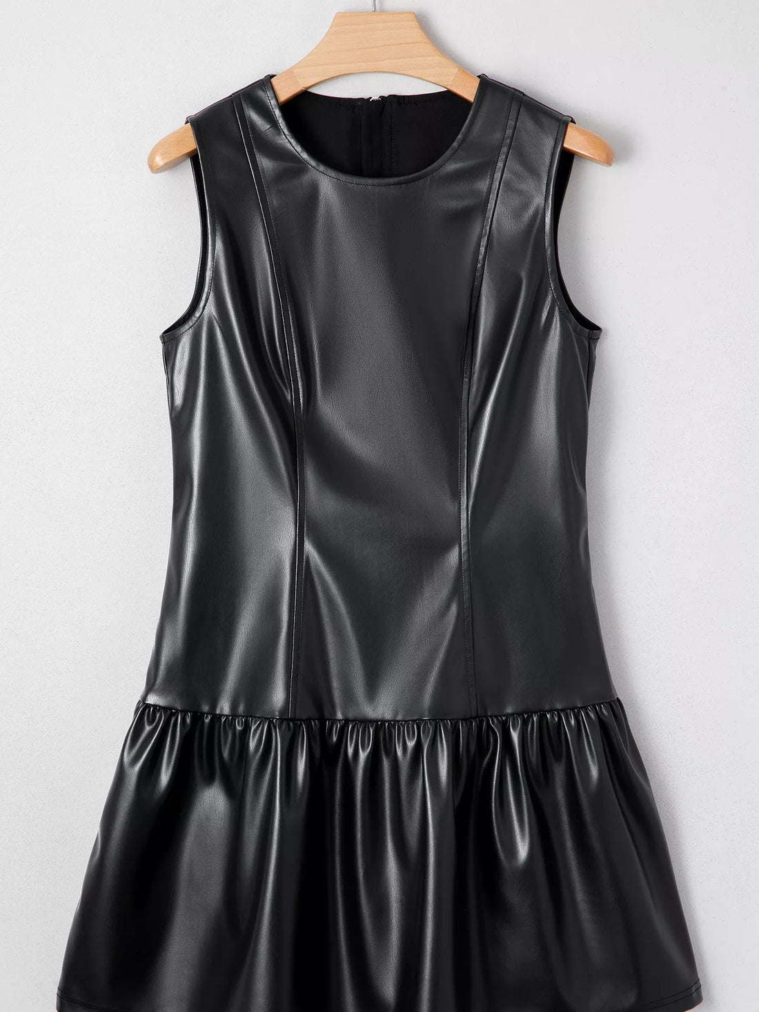 Faux Leather Ruffle Hem Sleeveless Mini Dress designed for comfort and style at Lookzlike