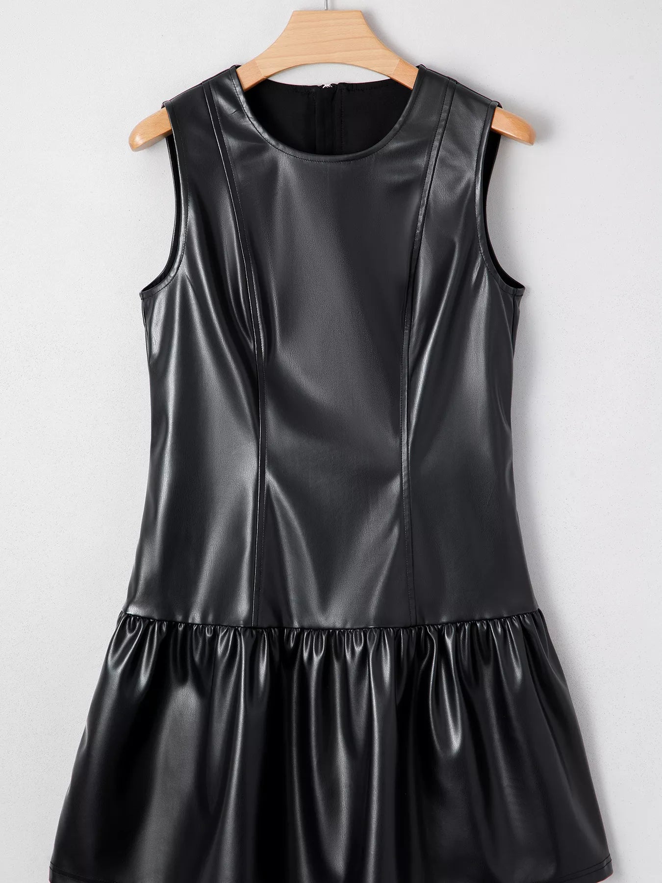 Faux Leather Ruffle Hem Sleeveless Mini Dress designed for comfort and style at Lookzlike
