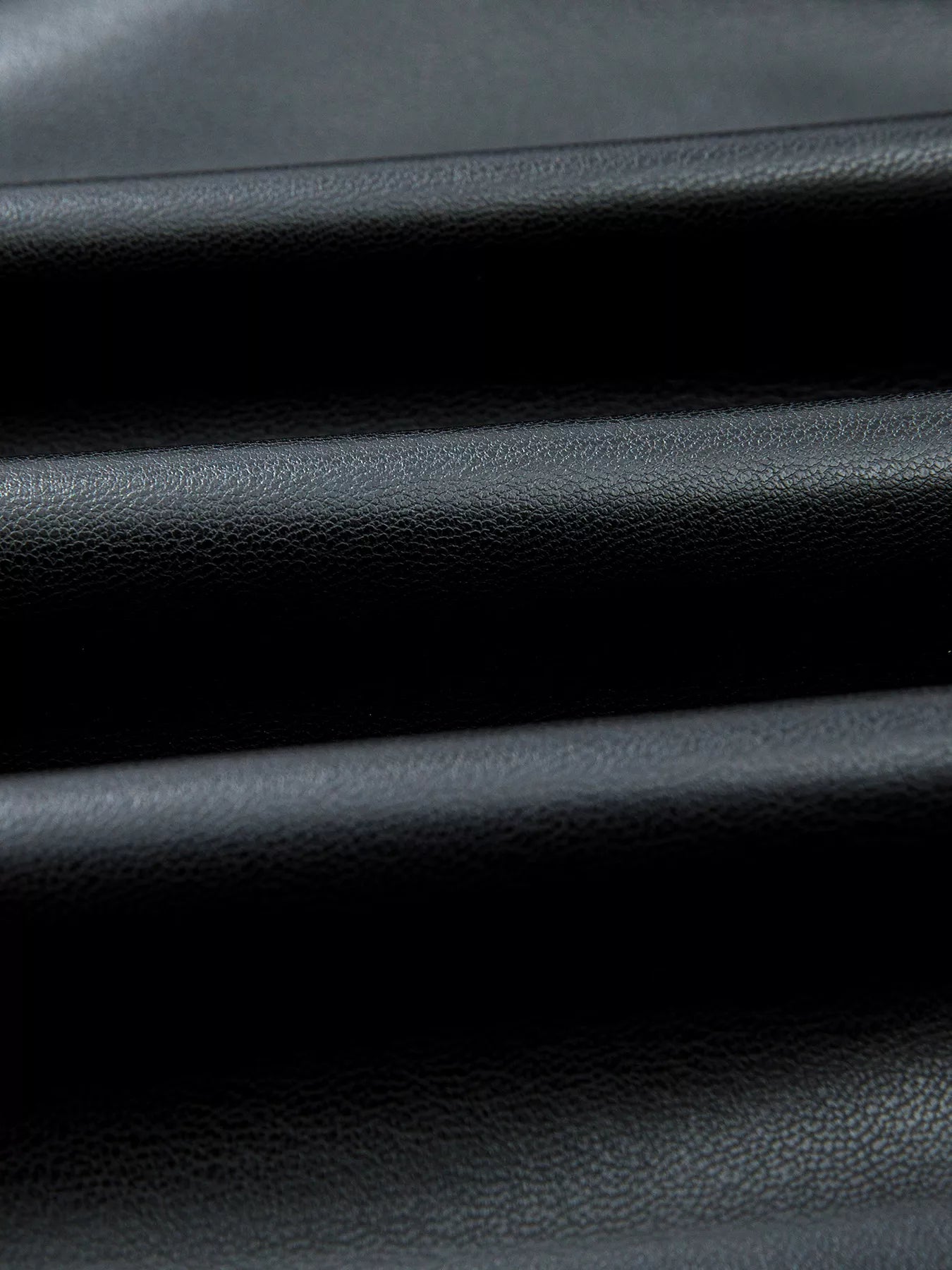 Faux Leather Ruffle Hem Sleeveless Mini Dress designed for comfort and style at Lookzlike