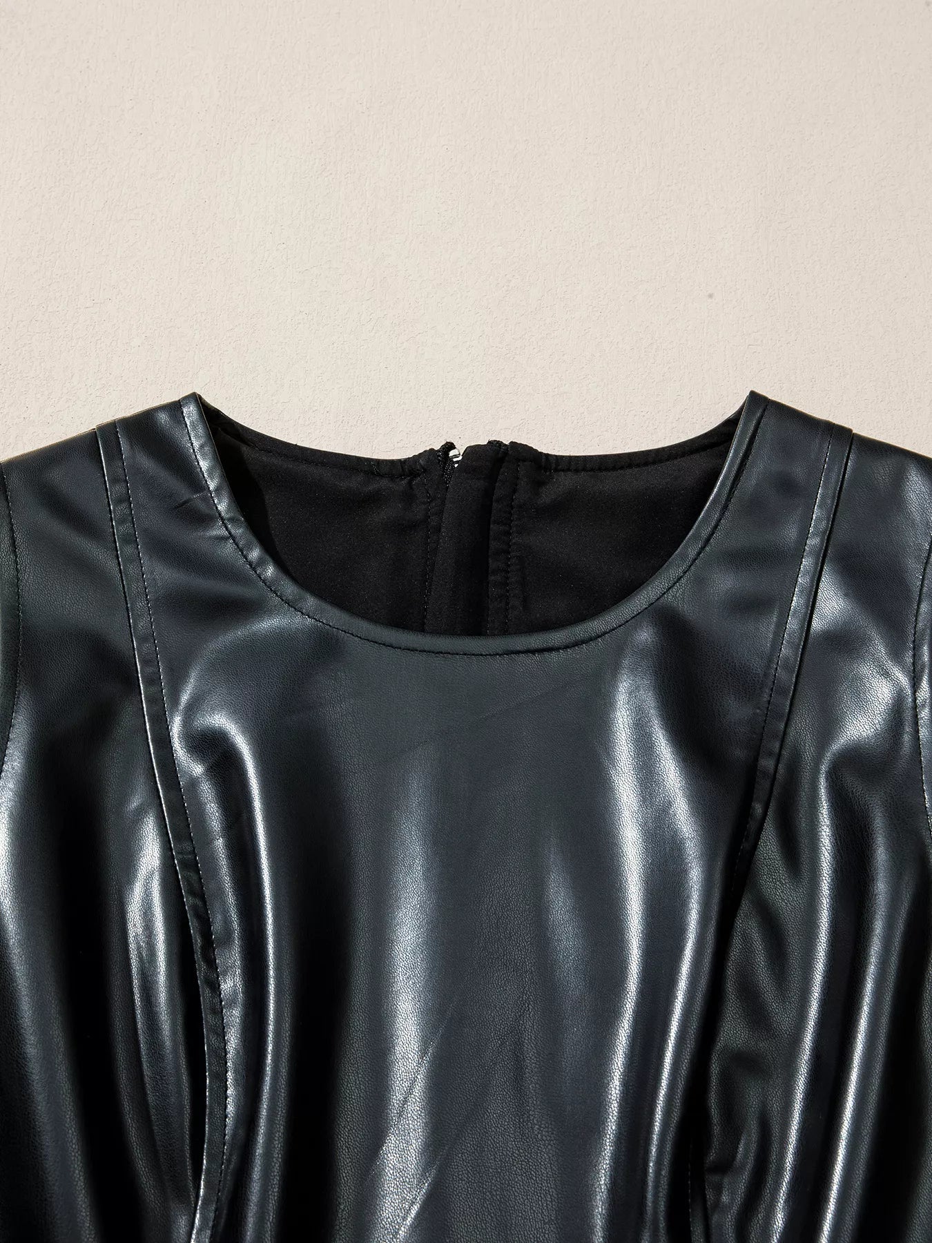 Faux Leather Ruffle Hem Sleeveless Mini Dress designed for comfort and style at Lookzlike