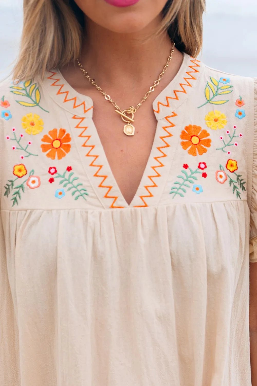 Floral Embroidery Pom Pom Ruffle Sleeves Mini Dress designed for comfort and style at Lookzlike