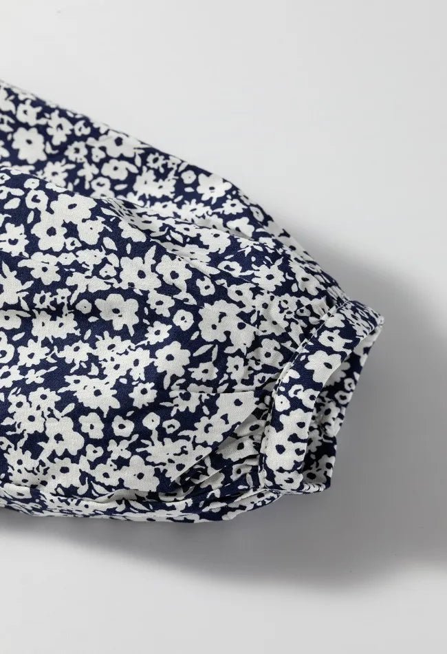 Floral Print Notched Long Sleeve Blouse designed for comfort and style at Lookzlike