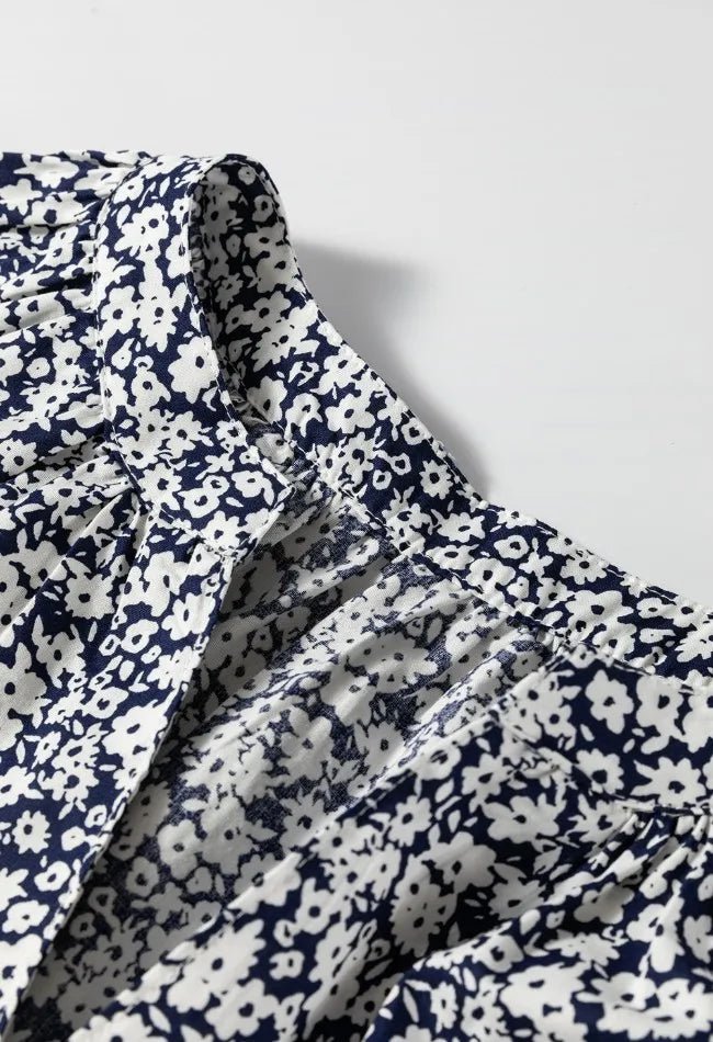 Floral Print Notched Long Sleeve Blouse designed for comfort and style at Lookzlike