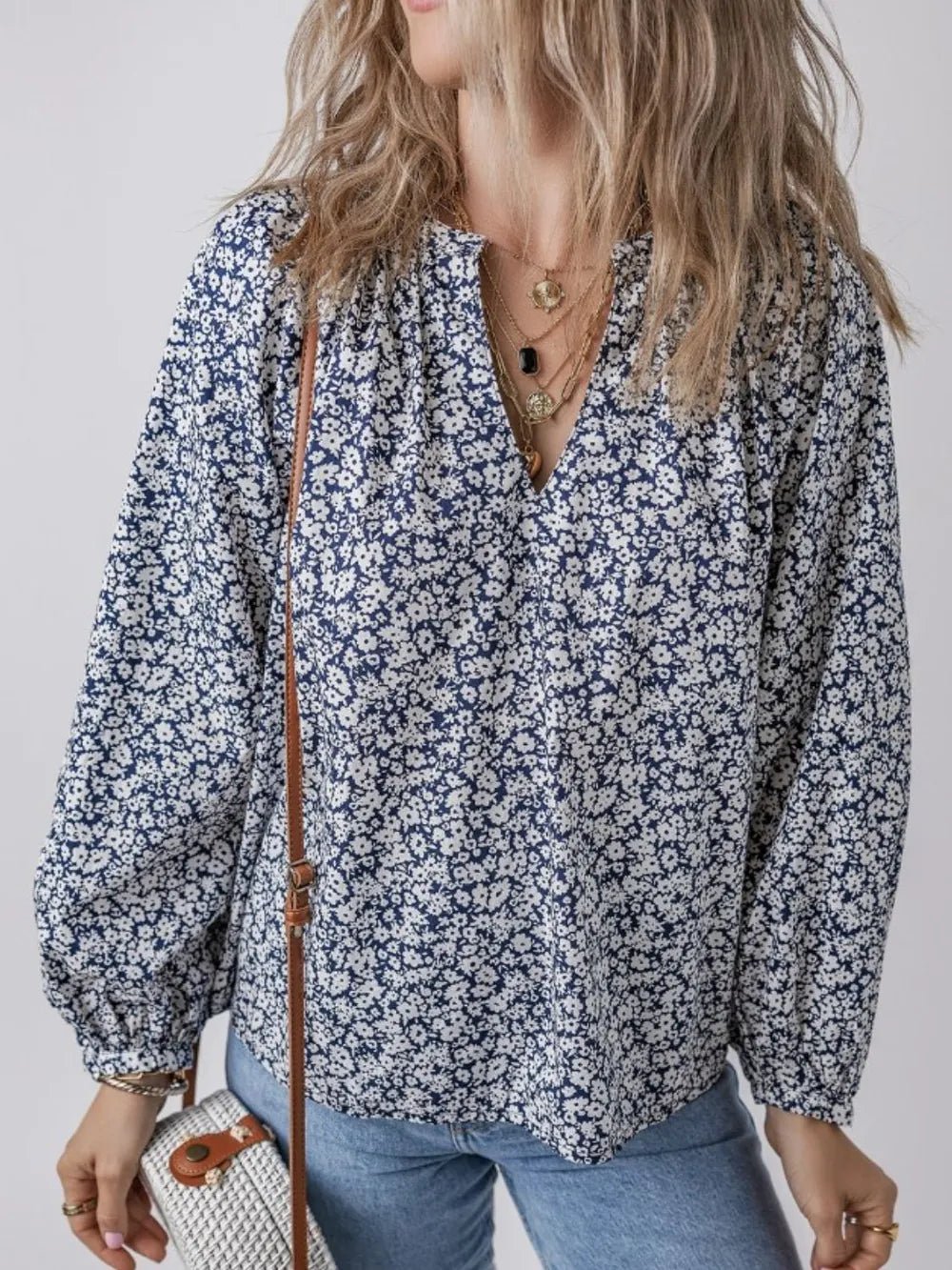 Floral Print Notched Long Sleeve Blouse designed for comfort and style at Lookzlike