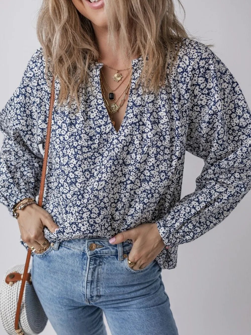 Floral Print Notched Long Sleeve Blouse designed for comfort and style at Lookzlike