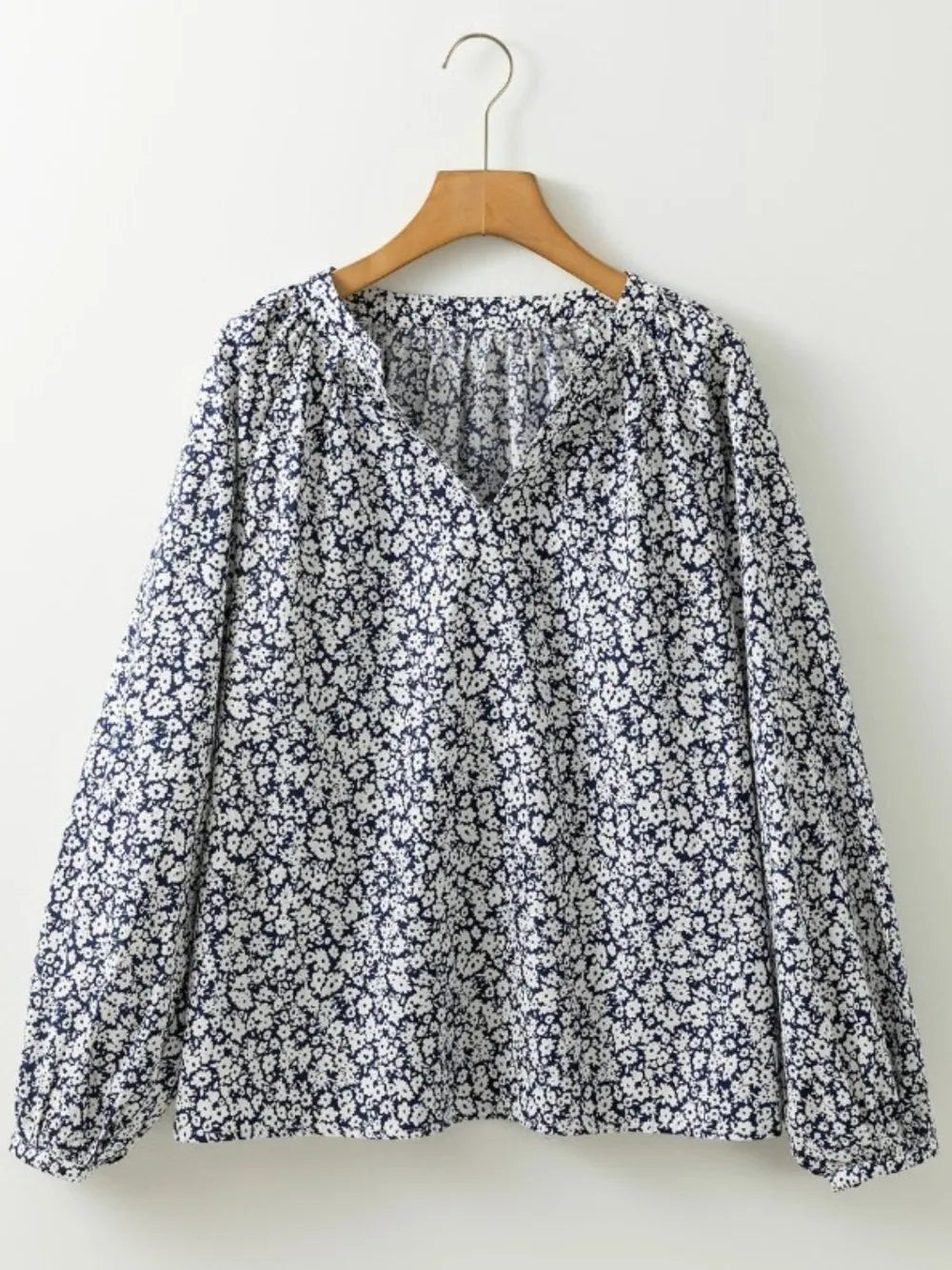Floral Print Notched Long Sleeve Blouse designed for comfort and style at Lookzlike