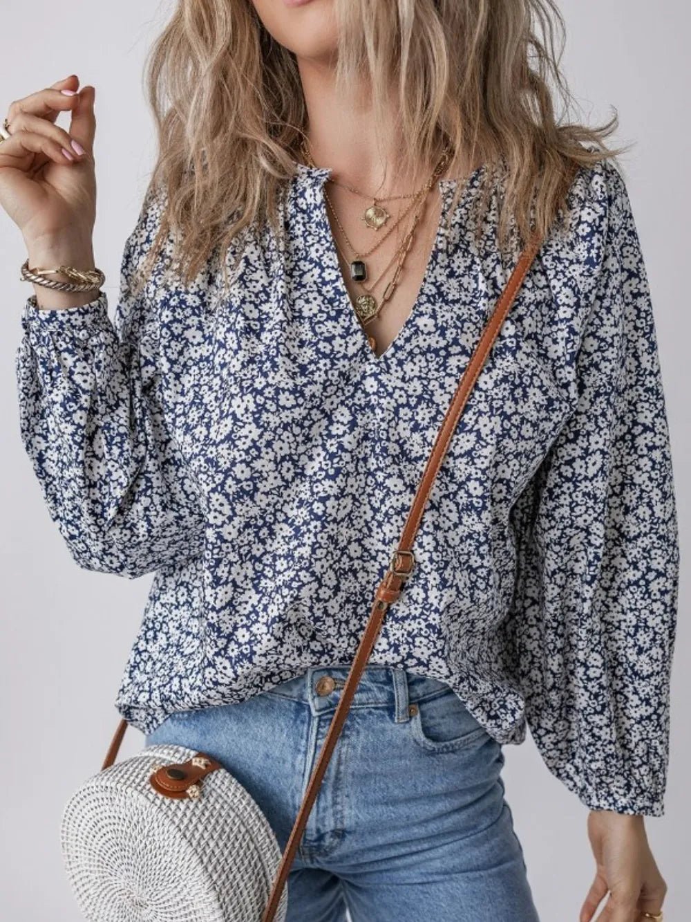 Floral Print Notched Long Sleeve Blouse designed for comfort and style at Lookzlike