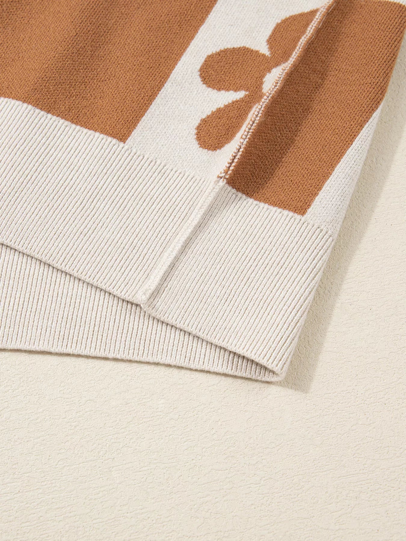 Flower Plaid Henley Baggy Sweater designed for comfort and style at Lookzlike