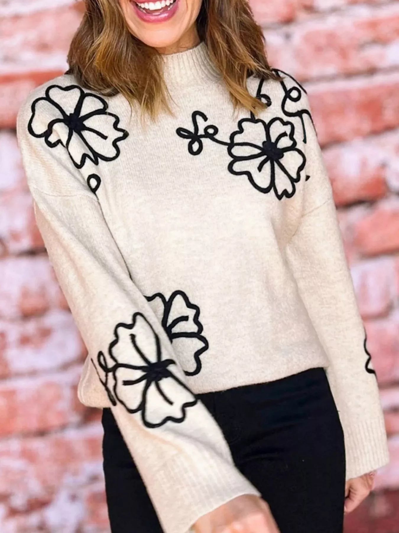 Flower Stitching Mock Neck Sweater designed for comfort and style at Lookzlike