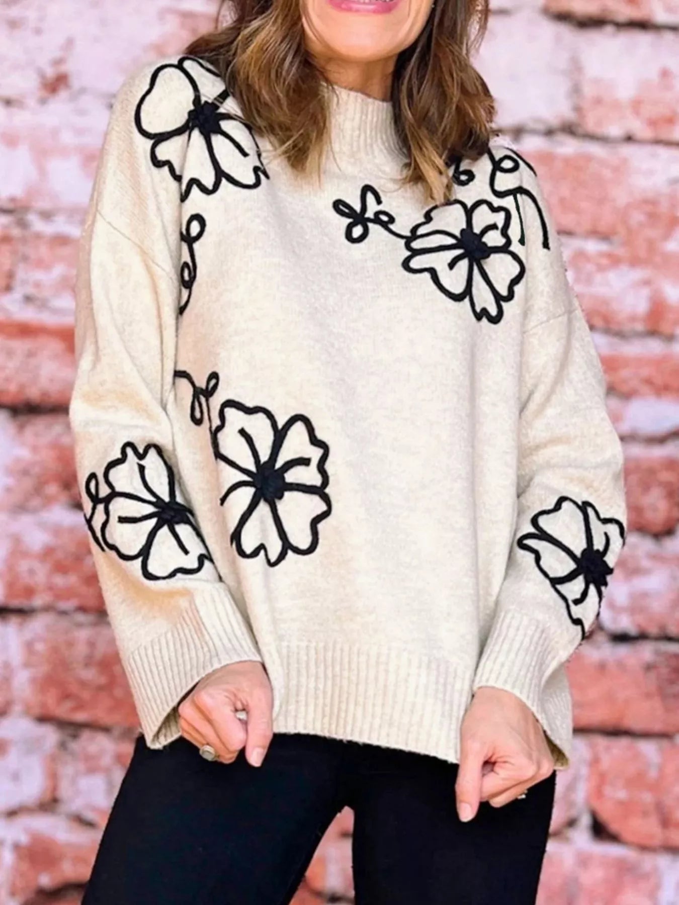 Flower Stitching Mock Neck Sweater designed for comfort and style at Lookzlike