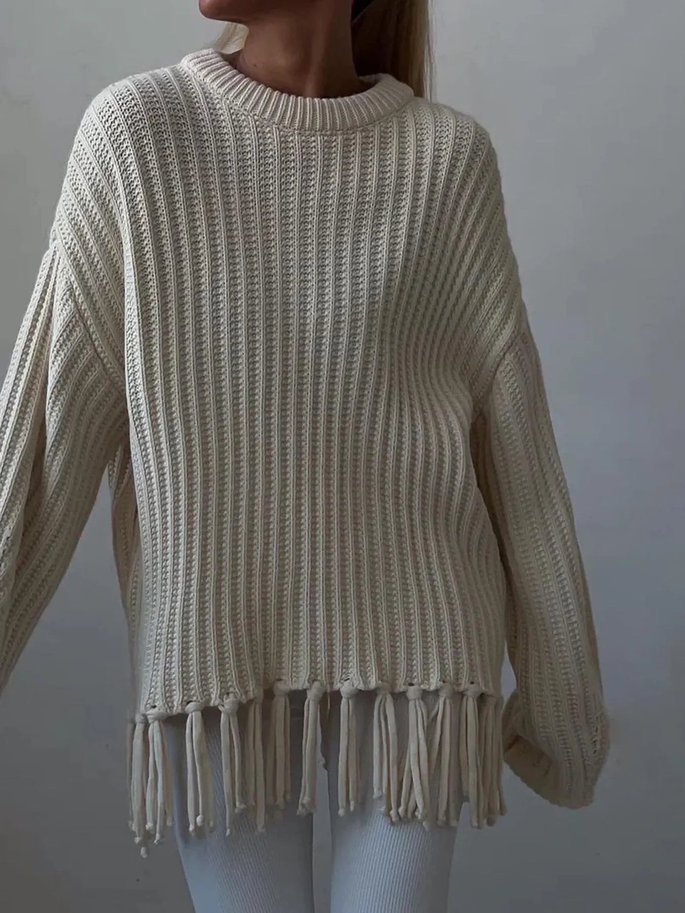 Fringe Round Neck Long Sleeve Sweater designed for comfort and style at Lookzlike