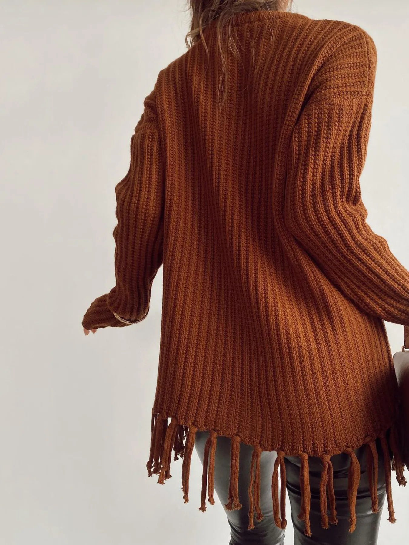 Fringe Round Neck Long Sleeve Sweater designed for comfort and style at Lookzlike