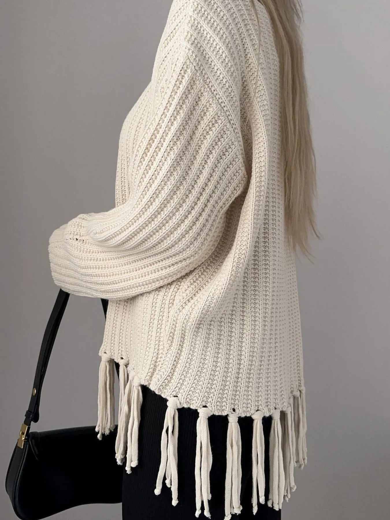 Fringe Round Neck Long Sleeve Sweater designed for comfort and style at Lookzlike