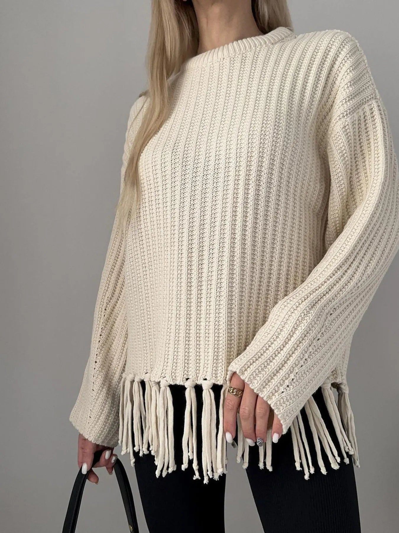 Fringe Round Neck Long Sleeve Sweater designed for comfort and style at Lookzlike
