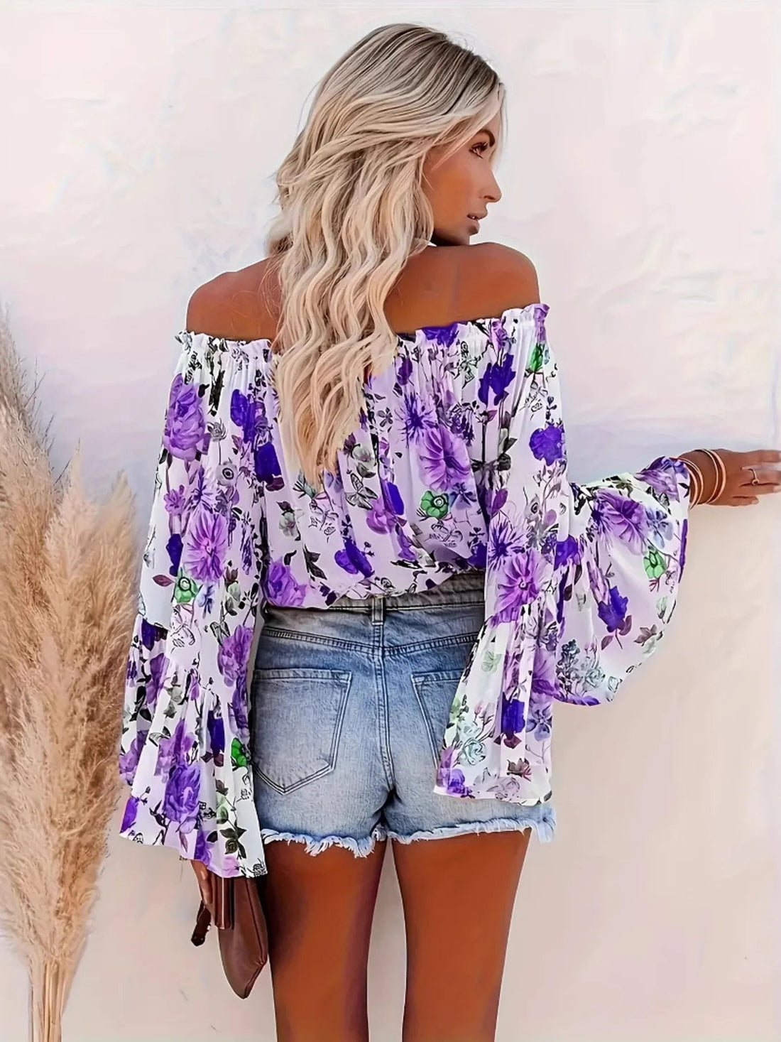 Full Size Floral Off - Shoulder Bell Sleeve Blouse Plus Size designed for comfort and style at Lookzlike