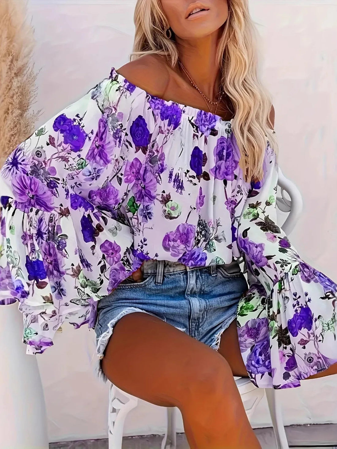 Full Size Floral Off - Shoulder Bell Sleeve Blouse Plus Size designed for comfort and style at Lookzlike