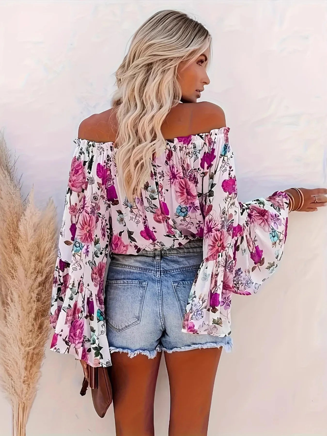 Full Size Floral Off - Shoulder Bell Sleeve Blouse Plus Size designed for comfort and style at Lookzlike
