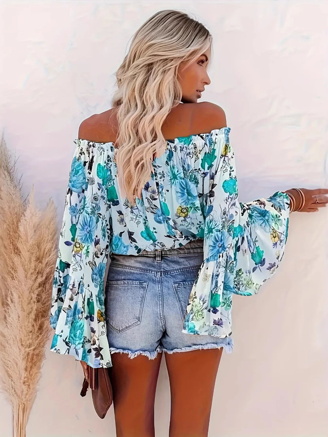 Full Size Floral Off - Shoulder Bell Sleeve Blouse Plus Size designed for comfort and style at Lookzlike