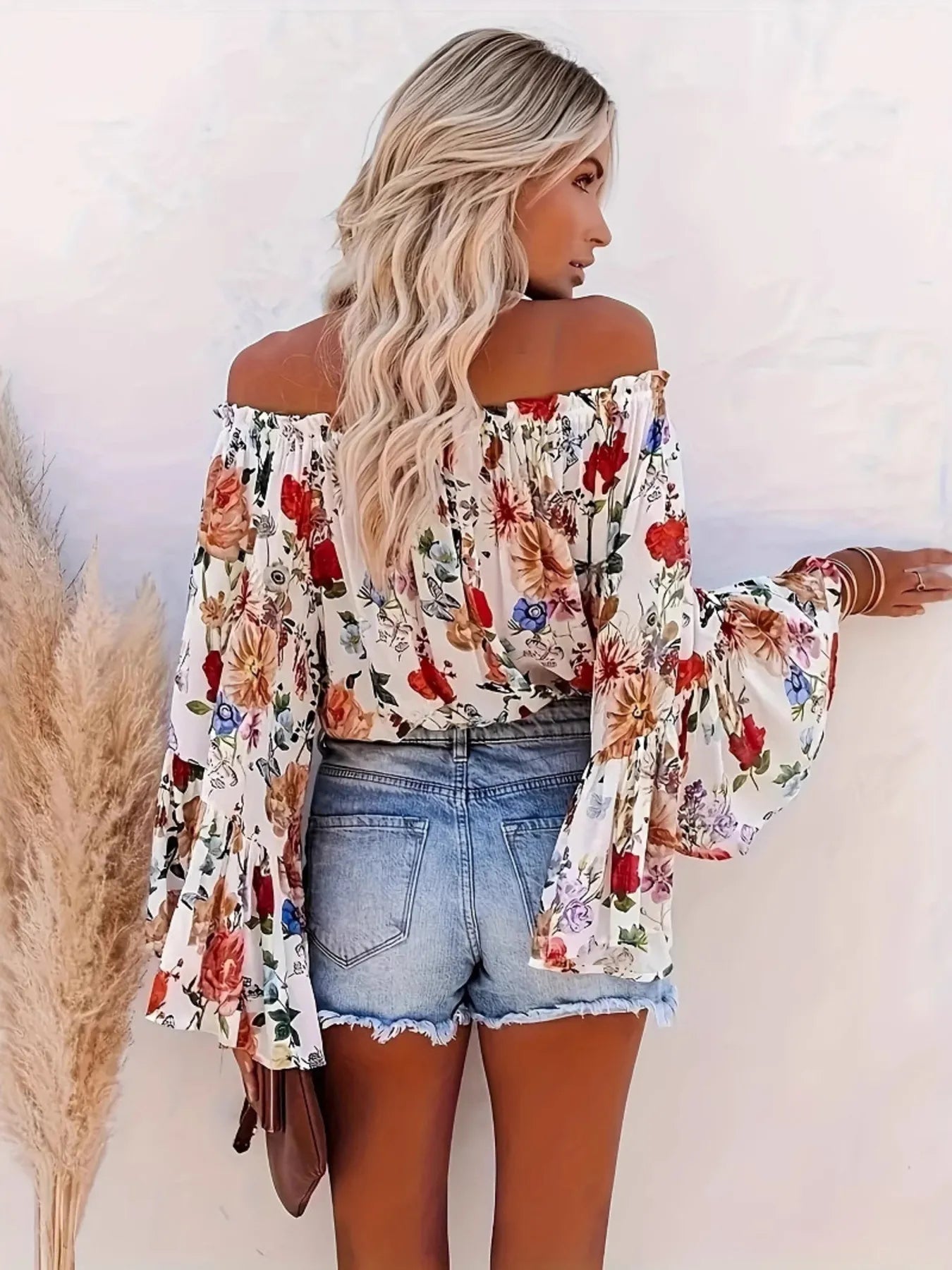 Full Size Floral Off - Shoulder Bell Sleeve Blouse Plus Size designed for comfort and style at Lookzlike