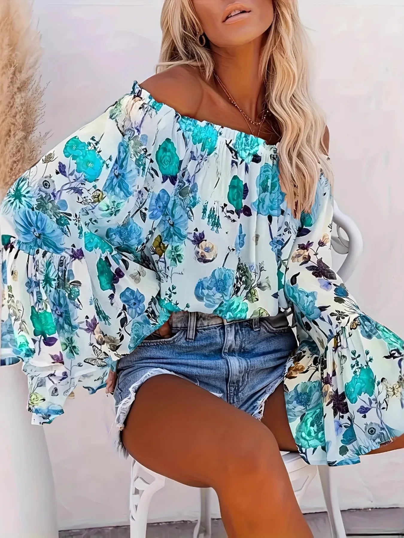 Full Size Floral Off - Shoulder Bell Sleeve Blouse Plus Size designed for comfort and style at Lookzlike