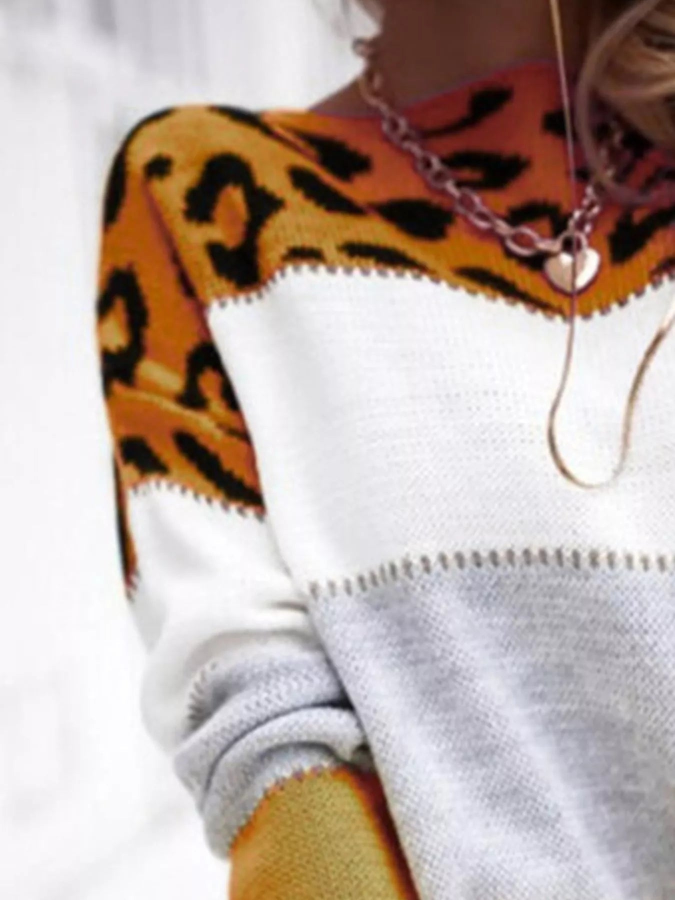 Full Size Leopard Color Block Long Sleeve Sweater Plus Size designed for comfort and style at Lookzlike