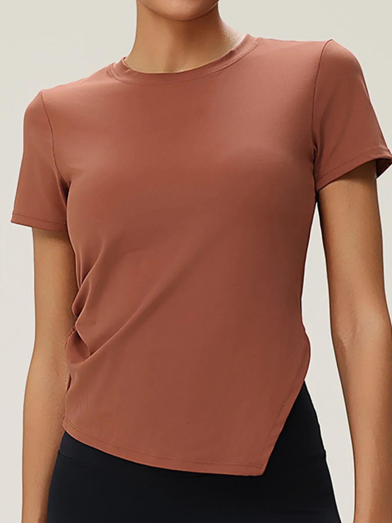 Full Size Slit Round Neck Short Sleeve Active T-Shirt Plus Size designed for comfort and style at Lookzlike