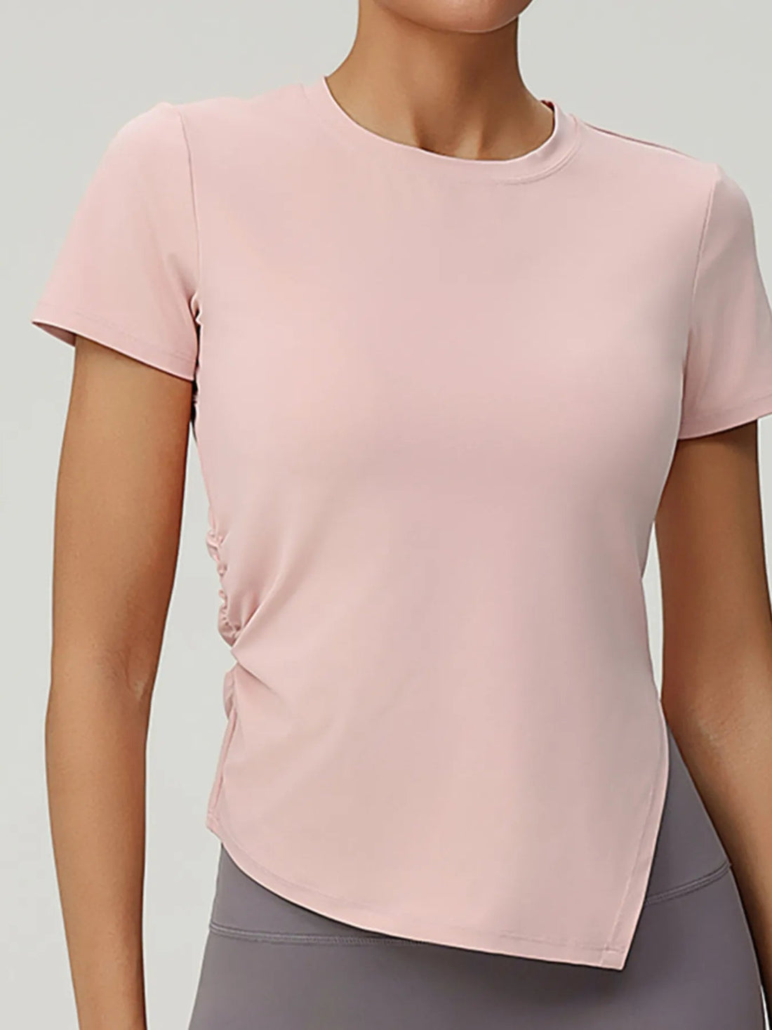 Full Size Slit Round Neck Short Sleeve Active T-Shirt Plus Size designed for comfort and style at Lookzlike