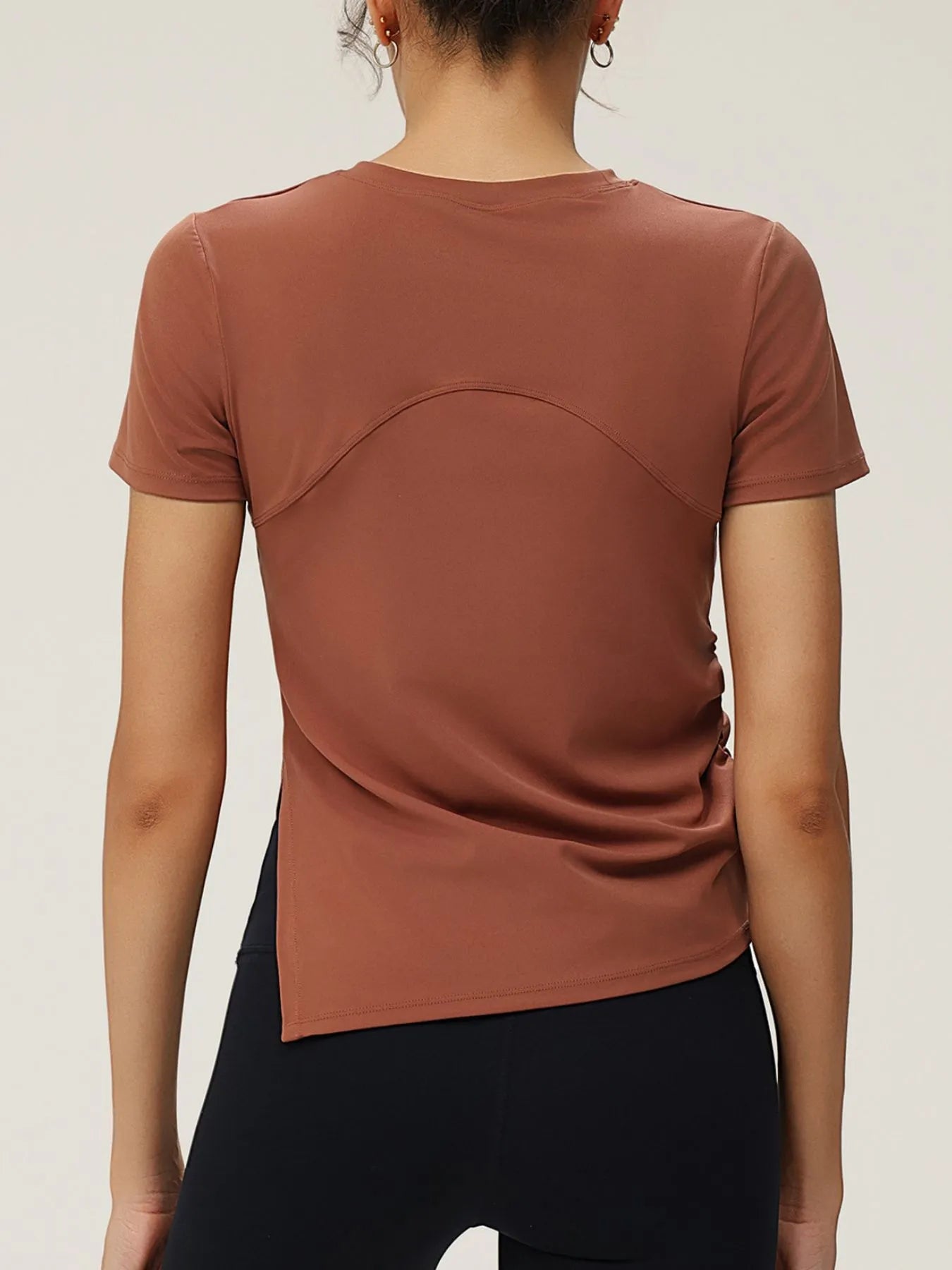 Full Size Slit Round Neck Short Sleeve Active T-Shirt Plus Size designed for comfort and style at Lookzlike