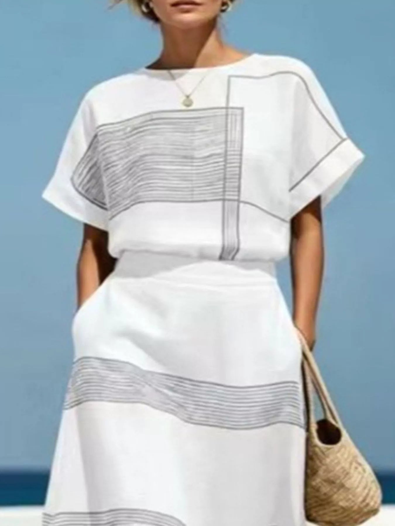 Full Size Striped Round Neck Top and Skirt Set Plus Size designed for comfort and style at Lookzlike