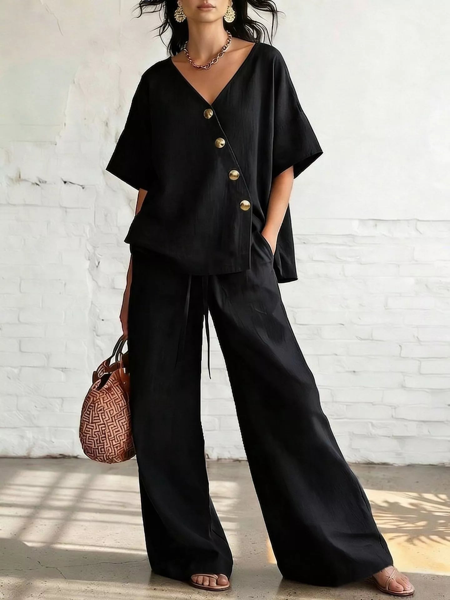 Full Size Surplice Half Sleeve Top and Wide-Leg Pants Set Plus Size designed for comfort and style at Lookzlike