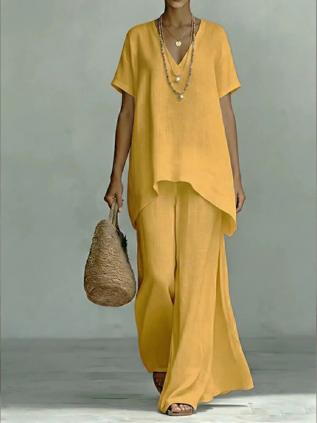 Full Size V-Neck Top and Wide-Leg Pants Set Plus Size designed for comfort and style at Lookzlike