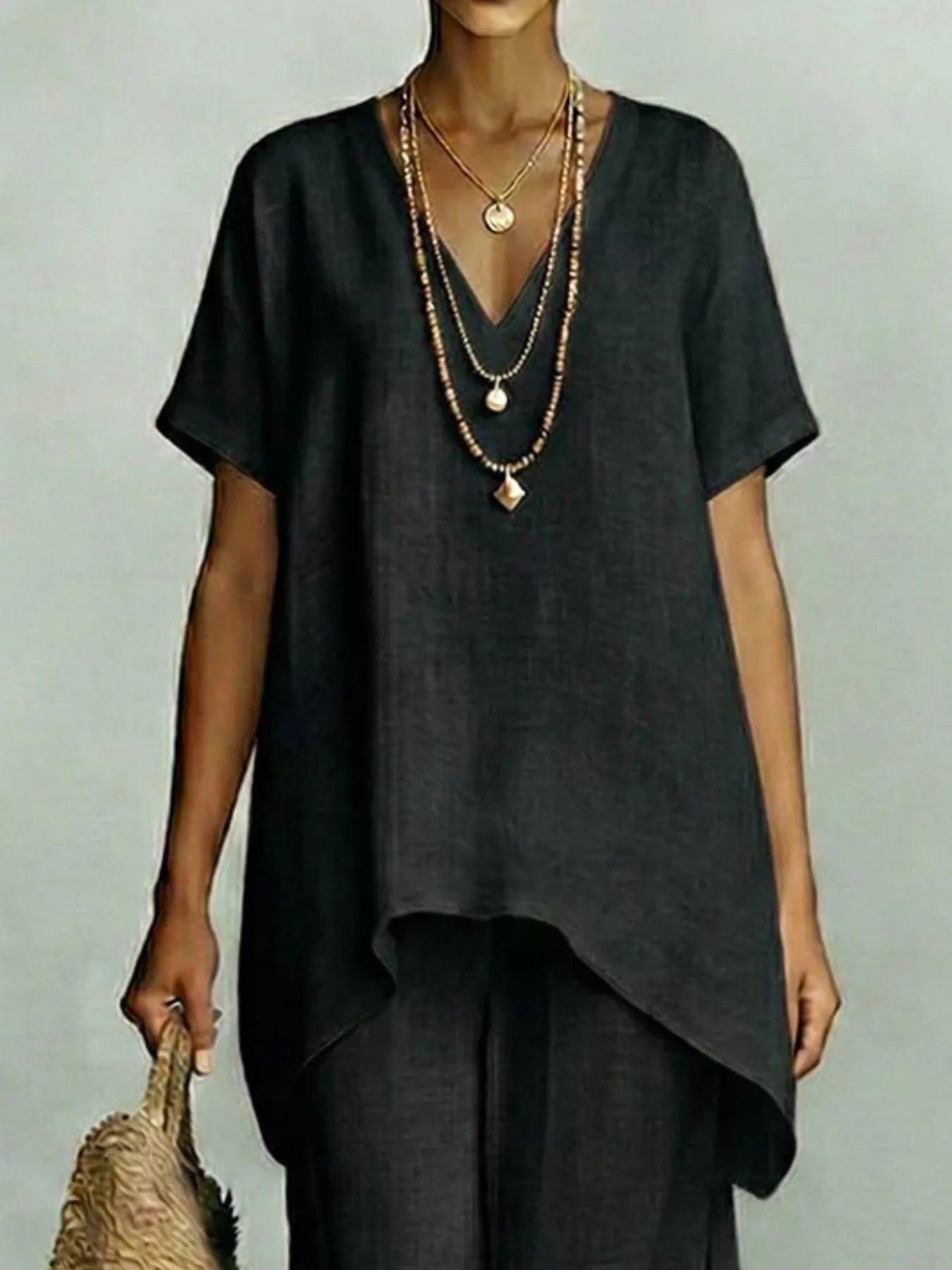 Full Size V-Neck Top and Wide-Leg Pants Set Plus Size designed for comfort and style at Lookzlike