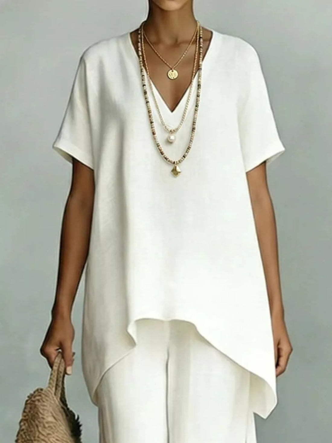 Full Size V-Neck Top and Wide-Leg Pants Set Plus Size designed for comfort and style at Lookzlike