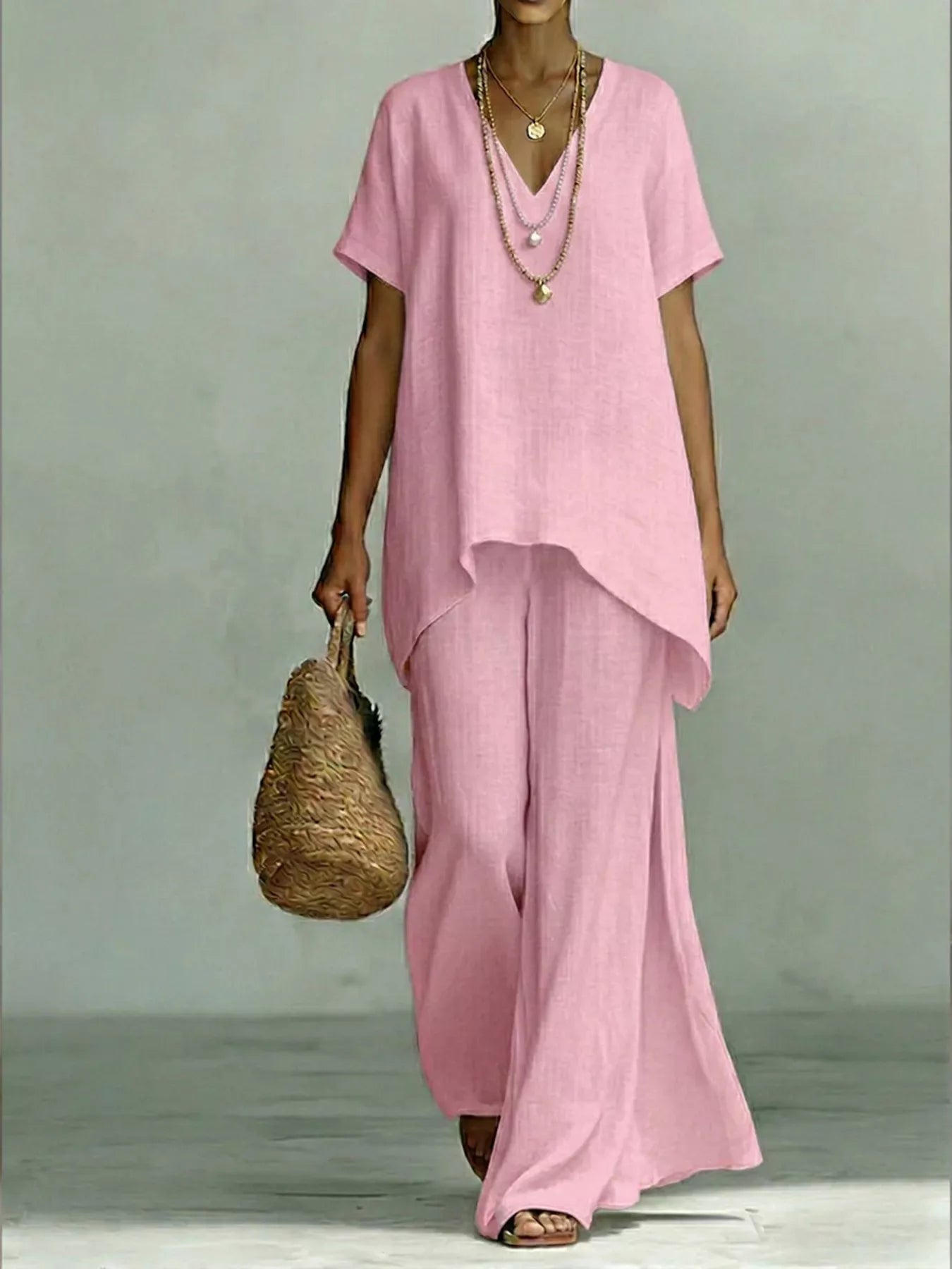 Full Size V-Neck Top and Wide-Leg Pants Set Plus Size designed for comfort and style at Lookzlike