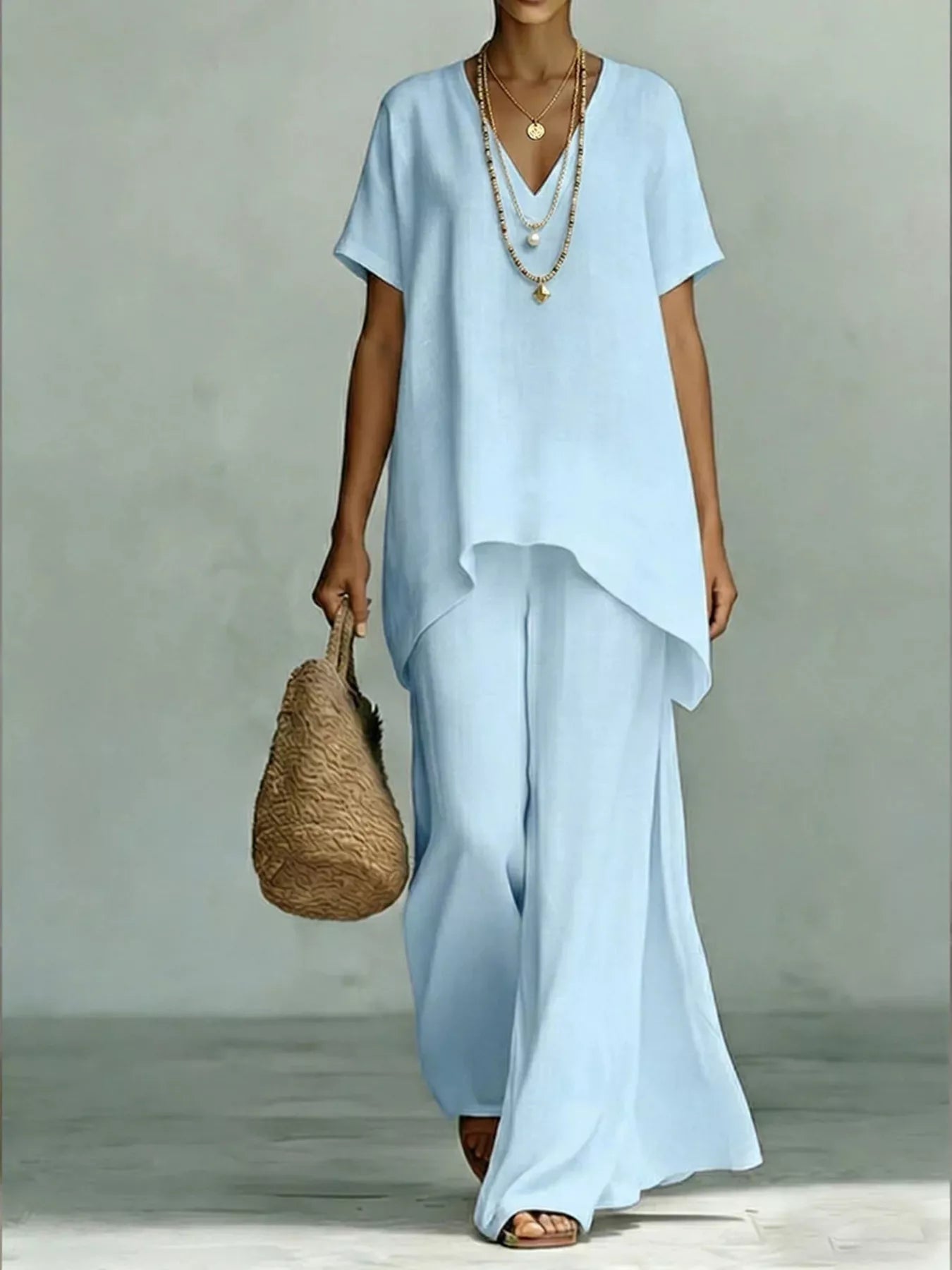 Full Size V-Neck Top and Wide-Leg Pants Set Plus Size designed for comfort and style at Lookzlike