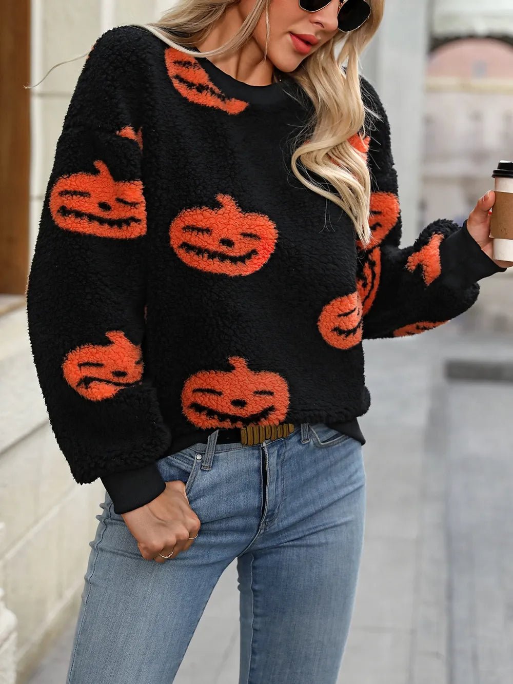 Fuzzy Pumpkin Round Neck Dropped Shoulder Sweater designed for comfort and style at Lookzlike
