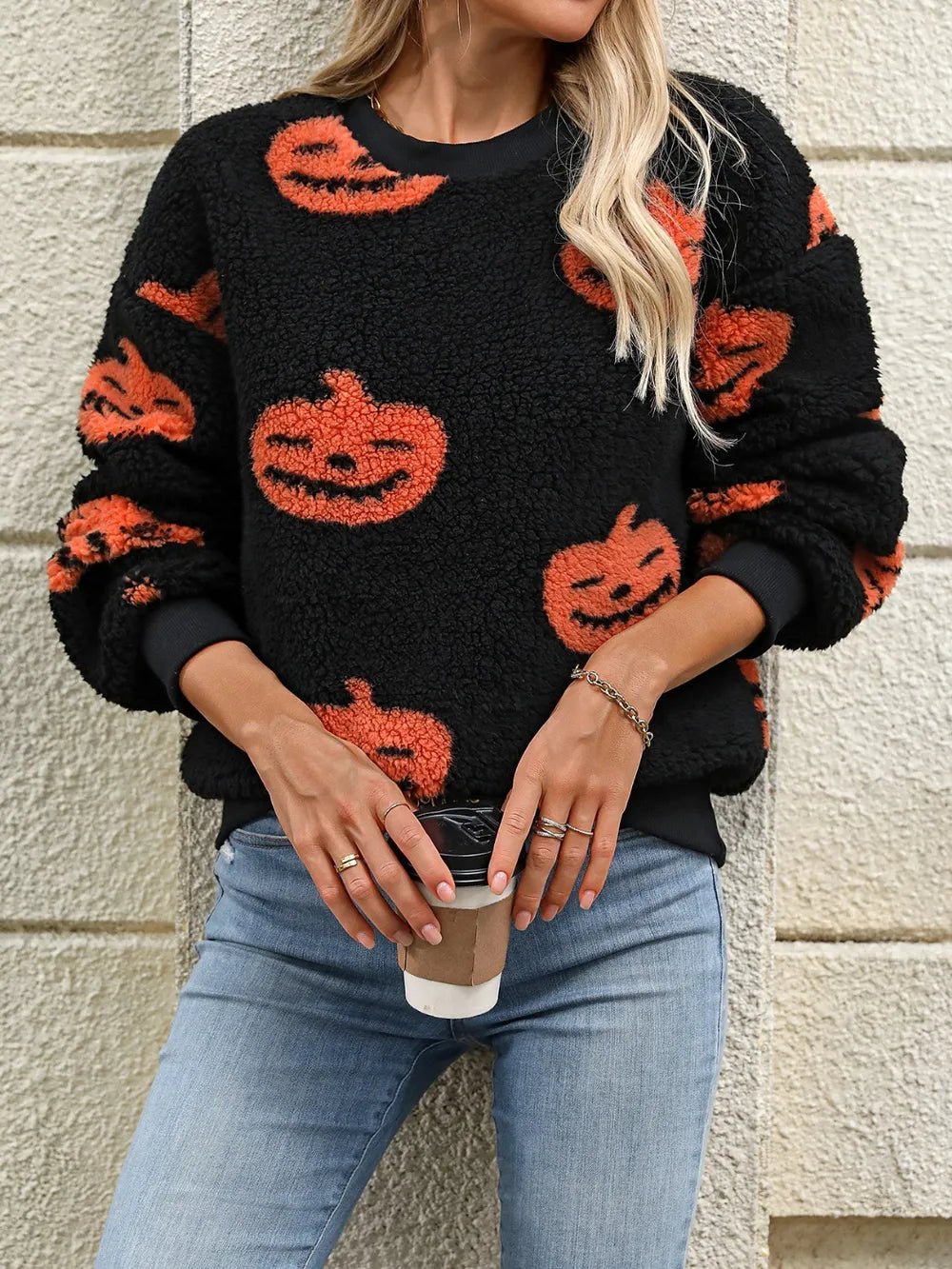 Fuzzy Pumpkin Round Neck Dropped Shoulder Sweater designed for comfort and style at Lookzlike