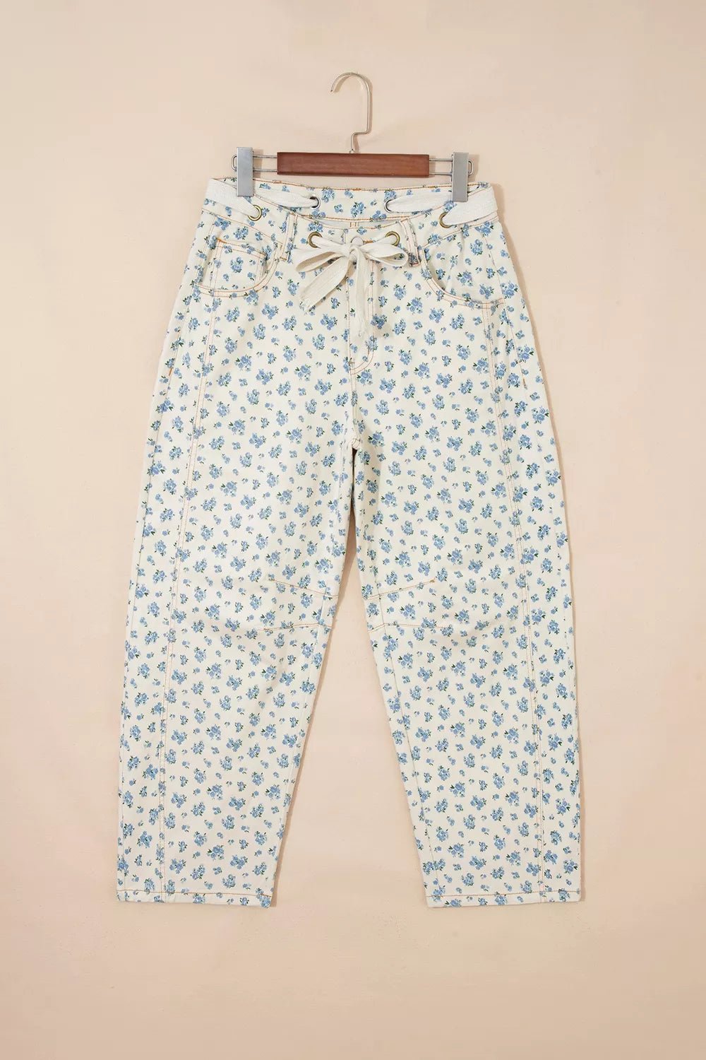 Grommet Knot Waist Floral Barrel Leg Jeans designed for comfort and style at Lookzlike