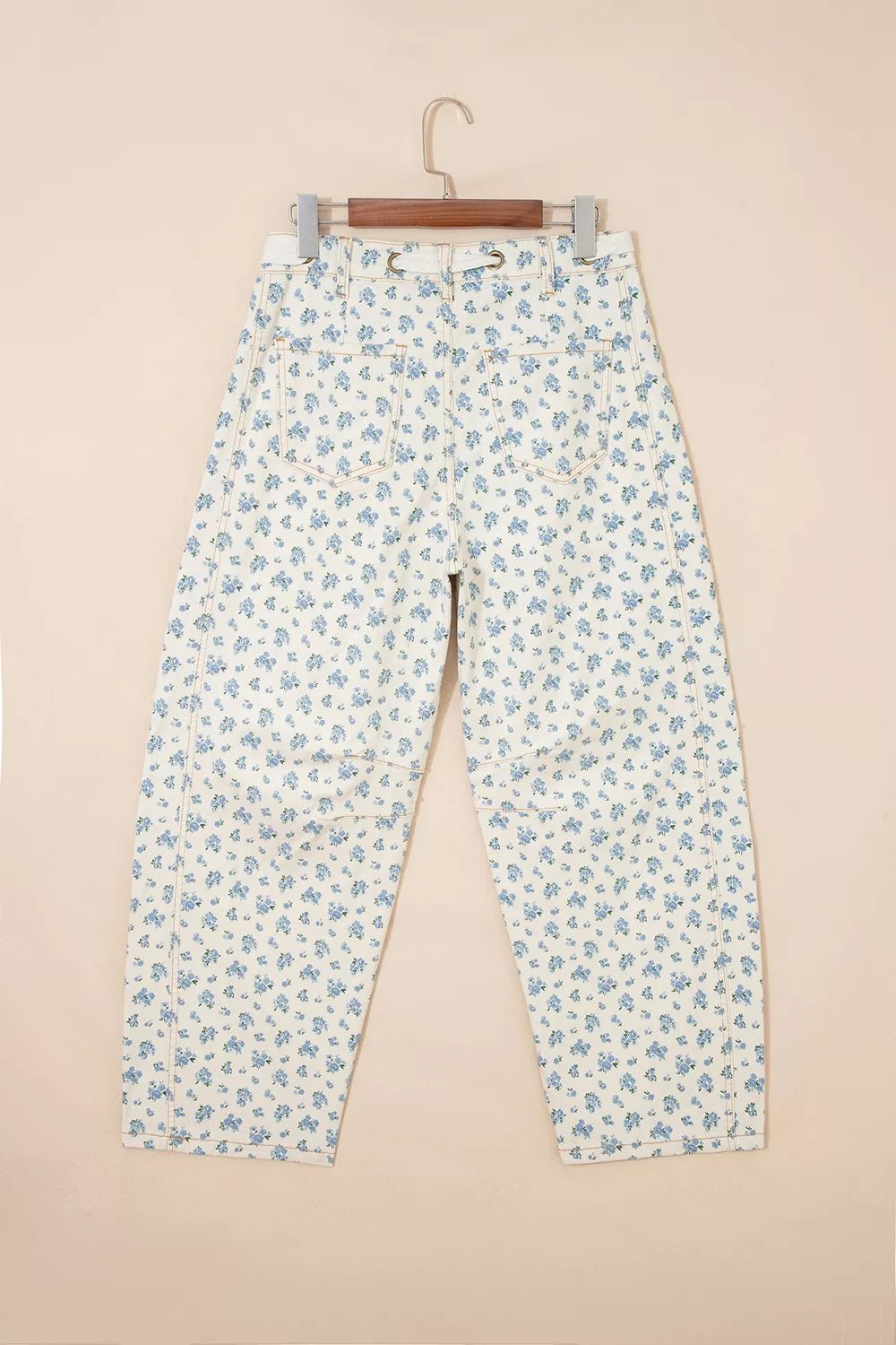 Grommet Knot Waist Floral Barrel Leg Jeans designed for comfort and style at Lookzlike