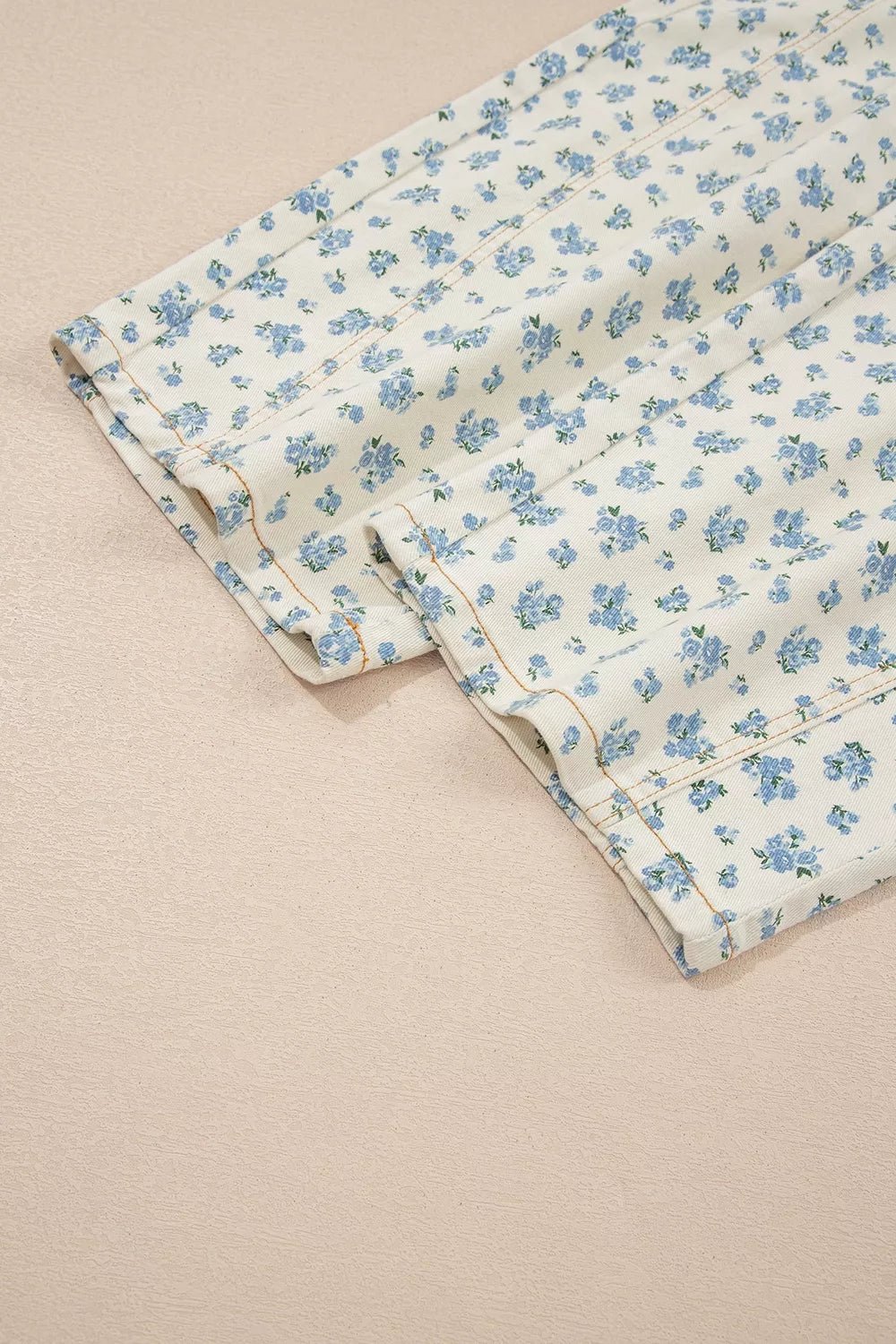 Grommet Knot Waist Floral Barrel Leg Jeans designed for comfort and style at Lookzlike